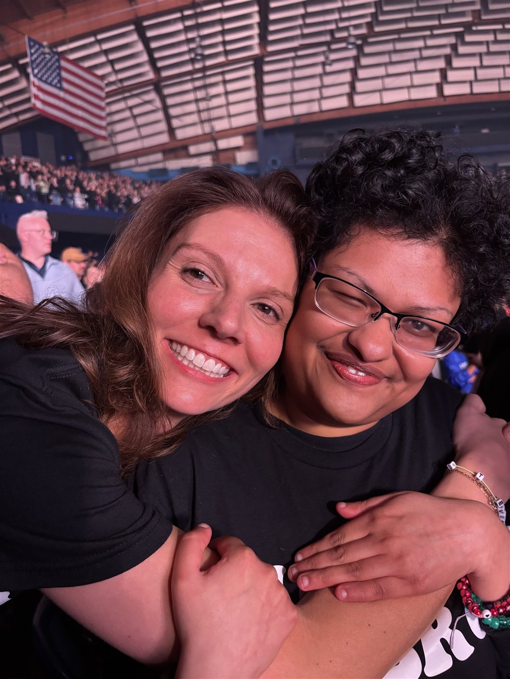 Stevie Schwer hugging Mitali, a Be Yourself Group friend, at a concert